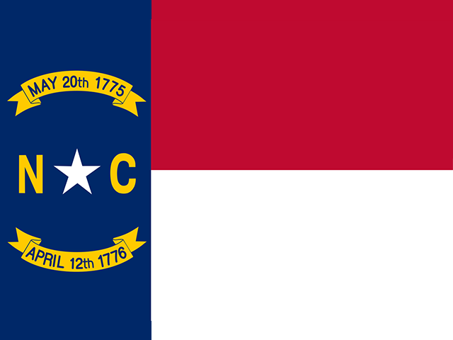 The flag of North Carolina features a blue vertical stripe with a white star and dates, and two horizontal stripes, red on top and white on the bottom.