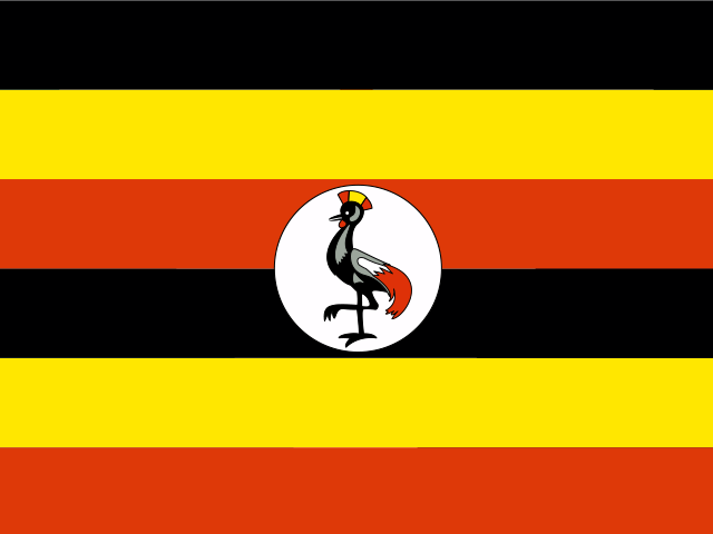 The flag of Uganda with six horizontal stripes in black, yellow, and red, and a white circle with a grey crowned crane at the center.